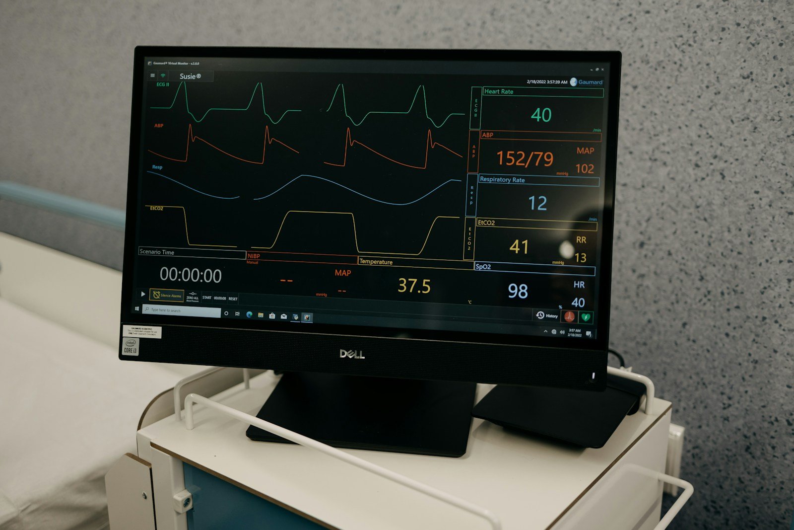 a monitor is on a stand in a room